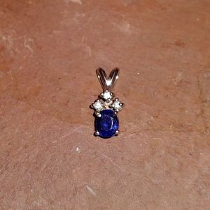 Custom made blue sapphire and diamond pendant